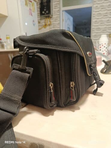 Fotoaparat üçün çiyin çantası - Rəng: qara - Material: sıx lalafo.az -da Fotoaparat üçün çiyin çantası - Rəng: qara - Material: sıx