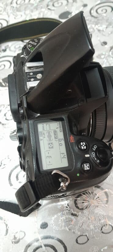 Nikon D7000 DSLR fotoaparat + Sigma DC 70–300mm f/4–5.6 teleobyektiv lalafo.az -da Nikon D7000 DSLR fotoaparat + Sigma DC 70–300mm f/4–5.6 teleobyektiv