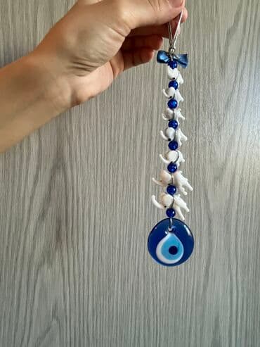 Gözmuncuğu aksesuarı. Üzəri kiçik ölçülü fil fiqurları ilə bəzədilib lalafo.az -da Gözmuncuğu aksesuarı. Üzəri kiçik ölçülü fil fiqurları ilə bəzədilib