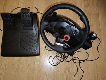PlayStation3 ilə yanaşı stolüstü sükan və pedallar da var. Yarış lalafo.az -da PlayStation3 ilə yanaşı stolüstü sükan və pedallar da var. Yarış