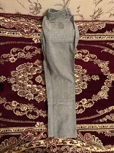 Boz rəngdə dar kəsimli şalvar/pantolon. - Material: nazik, yumşaq lalafo.az -da Boz rəngdə dar kəsimli şalvar/pantolon. - Material: nazik, yumşaq