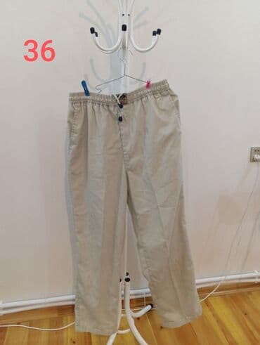 Bej rəngli kişi şalvarı - Ölçü: 36 (şəkildə göstərilib) - Model lalafo.az -da Bej rəngli kişi şalvarı - Ölçü: 36 (şəkildə göstərilib) - Model