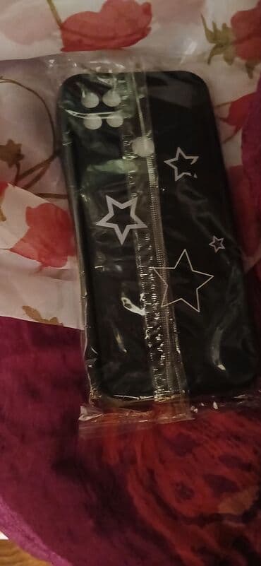 Ulduz naxışlı telefon üzü - Rəng: qara, ağ ulduz printi - Material lalafo.az -da Ulduz naxışlı telefon üzü - Rəng: qara, ağ ulduz printi - Material