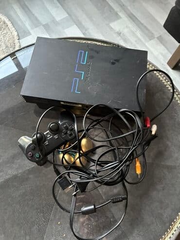 Evdə əyləncə üçün nəzərdə tutulmuş Sony PlayStation 2 oyun konsolu lalafo.az -da Evdə əyləncə üçün nəzərdə tutulmuş Sony PlayStation 2 oyun konsolu