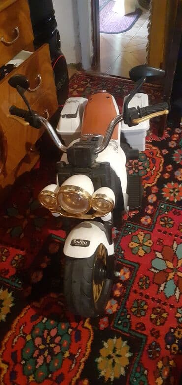 Uşaq üçün elektrikli motosiklet - Rəng: ağ/qızılı detallarla, qəhvəyi lalafo.az -da Uşaq üçün elektrikli motosiklet - Rəng: ağ/qızılı detallarla, qəhvəyi