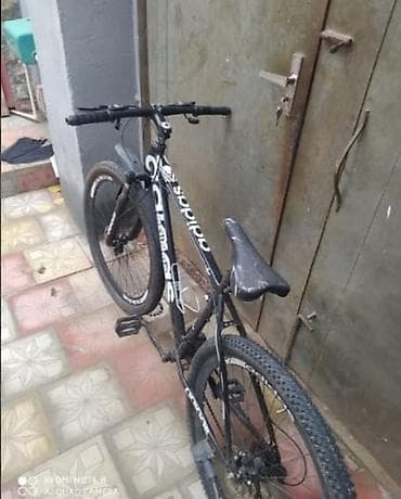 Məhsul: Dağ/şəhər tipli velosiped - Rəng: Qaralı-ağ loqotipli dizayn lalafo.az -da — 3 Məhsul: Dağ/şəhər tipli velosiped - Rəng: Qaralı-ağ loqotipli dizayn — 3