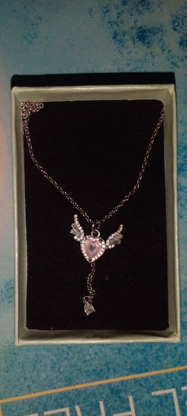 Polad boyunbağı – ürək və qanad lalafo.az -da Polad boyunbağı – ürək və qanad