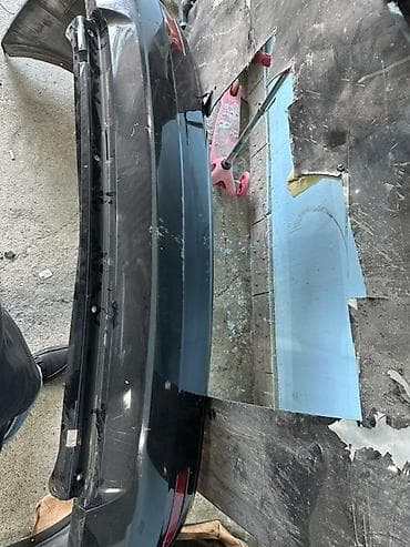Arxa bamper — qara rəngdə, orijinal zavod detalı. - Material lalafo.az -da Arxa bamper — qara rəngdə, orijinal zavod detalı. - Material