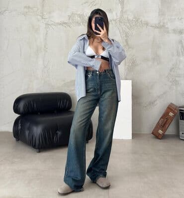 Geniş balaqlı və bol kəsimli, yüksək belli cins şalvar. Gündəlik geyim lalafo.az -da Geniş balaqlı və bol kəsimli, yüksək belli cins şalvar. Gündəlik geyim