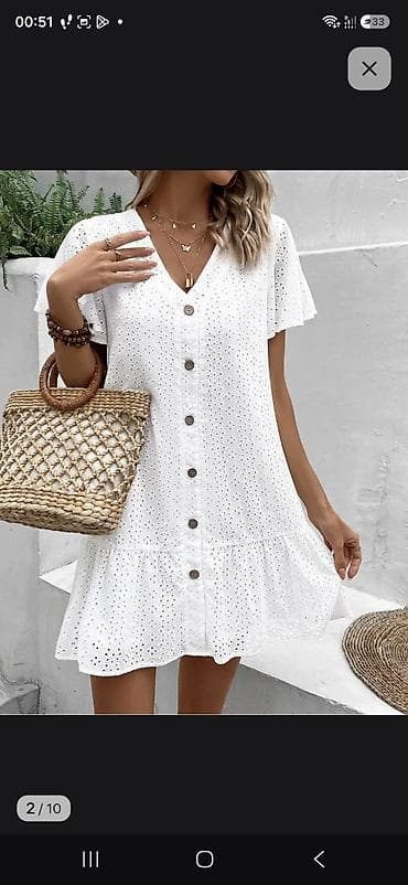 Ağ rəngli yay paltarı – broderiya detalı, V-yaxa, qısa ətək uclu və lalafo.az -da Ağ rəngli yay paltarı – broderiya detalı, V-yaxa, qısa ətək uclu və