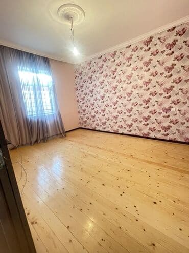 Bu mənzildə taxta döşəmələr, müasir divar kağızları və geniş lalafo.az -da Bu mənzildə taxta döşəmələr, müasir divar kağızları və geniş