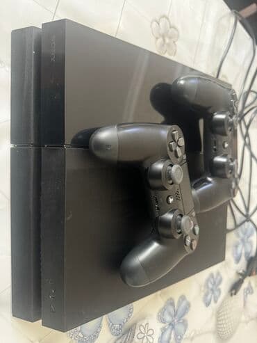 Məhsul: Sony PlayStation 4 (PS4) konsolu + 2 ədəd DualShock 4 gamepad lalafo.az -da Məhsul: Sony PlayStation 4 (PS4) konsolu + 2 ədəd DualShock 4 gamepad