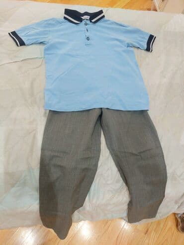 купить парты школьные: Açıq mavi rəngdə polo köynək və boz şalvardan ibarət uşaq məktəbli at lalafo.az — 1 купить парты школьные: Açıq mavi rəngdə polo köynək və boz şalvardan ibarət uşaq məktəbli — 1