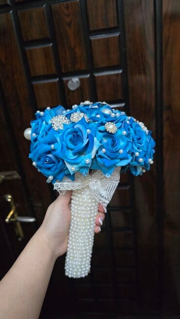 Mavi güllərdən hazırlanmış zərif gəlin buketi - Parlaq mavi rəngli lalafo.az -da Mavi güllərdən hazırlanmış zərif gəlin buketi - Parlaq mavi rəngli