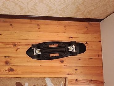 Kruizer tipli uzun skeytbord - Gövdə: uzun, dalğa/okean temalı rəngli at lalafo.az Kruizer tipli uzun skeytbord - Gövdə: uzun, dalğa/okean temalı rəngli