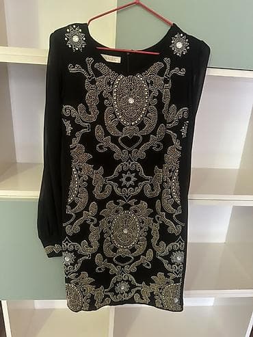 Zərif detallar ilə bəzədilmiş qara qadın donu - Rəng: dərin qara - lalafo.az -da Zərif detallar ilə bəzədilmiş qara qadın donu - Rəng: dərin qara -