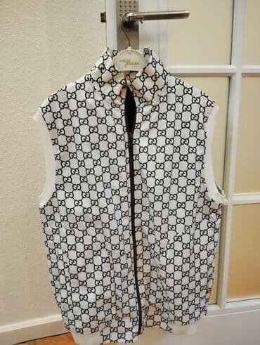 Ağ-qara naxışlı, qolsuz kişi/jinsilər üçün yelek. - Üst hissə: ağ lalafo.az -da Ağ-qara naxışlı, qolsuz kişi/jinsilər üçün yelek. - Üst hissə: ağ