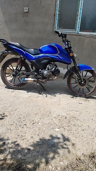 Mavi rəngli yolsuzluq üslublu motosiklet. Texniki və dizayn lalafo.az -da Mavi rəngli yolsuzluq üslublu motosiklet. Texniki və dizayn