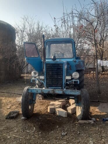 Mavi rəngli tək kabinəli təkərli traktor Texniki xüsusiyyətlər və lalafo.az -da Mavi rəngli tək kabinəli təkərli traktor Texniki xüsusiyyətlər və