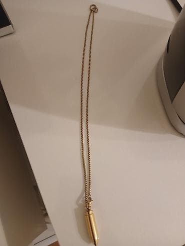 Qızılı rəngli güllə formalı kulon boyunbağı - Material: metal lalafo.az -da Qızılı rəngli güllə formalı kulon boyunbağı - Material: metal