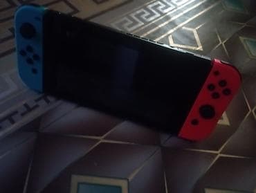 Nintendo Switch (Neon Blue/Neon Red Joy‑Con) - Daşımaq üçün ideal lalafo.az -da Nintendo Switch (Neon Blue/Neon Red Joy‑Con) - Daşımaq üçün ideal