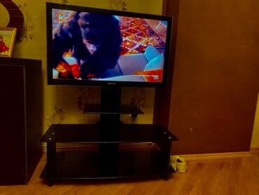 Кондиционеры: TV stendi: - Material: qara temperli şüşə rəflər + metal dayaqlar - at lalafo.az — 1 Кондиционеры: TV stendi: - Material: qara temperli şüşə rəflər + metal dayaqlar - — 1