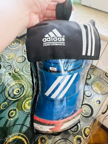 Adidas markasına məxsus mavi rəngli boks əlcəkləri. Əlcəklər "Amateur lalafo.az -da — 1 Adidas markasına məxsus mavi rəngli boks əlcəkləri. Əlcəklər "Amateur — 1