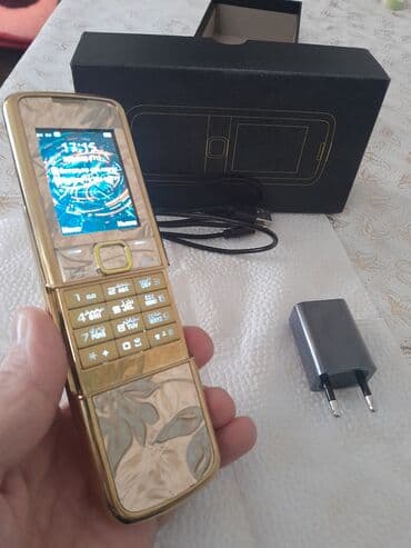 Qızılı rəngdə sürgülü düyməli mobil telefon - Korpus: qızılı rəngli lalafo.az -da Qızılı rəngdə sürgülü düyməli mobil telefon - Korpus: qızılı rəngli