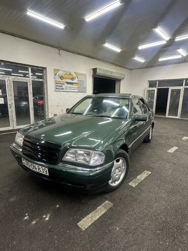 === PART 1: TEXTUAL DESCRIPTION === Bu tünd yaşıl rəngli Mercedes-Benz lalafo.az -da === PART 1: TEXTUAL DESCRIPTION === Bu tünd yaşıl rəngli Mercedes-Benz