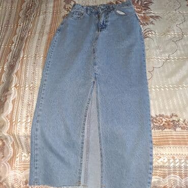 Açıq mavi rəngdə, uzun, cins ətək. Öndən yarıqlı dizaynı ilə hərəkət lalafo.az -da Açıq mavi rəngdə, uzun, cins ətək. Öndən yarıqlı dizaynı ilə hərəkət