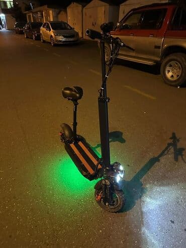 Elektrik skuter – güclü işıqlandırma və oturacaqlı model - Ön hissədə lalafo.az -da Elektrik skuter – güclü işıqlandırma və oturacaqlı model - Ön hissədə