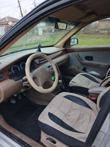 AzsamadSymbol / Thalia sedan - Kuzov: gümüşü rəng, 4 qapı, tam ölçülü lalafo.az -da AzsamadSymbol / Thalia sedan - Kuzov: gümüşü rəng, 4 qapı, tam ölçülü