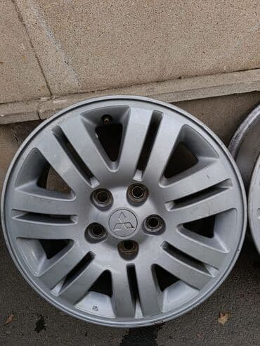 Mitsubishi orijinal yüngül lehimli disklər komplekti (4 ədəd) - lalafo.az -da Mitsubishi orijinal yüngül lehimli disklər komplekti (4 ədəd) -