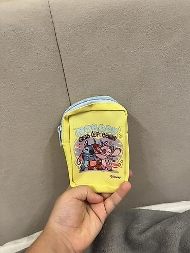 Disney temalı kiçik aksesuar çantası - Rəng: Sarı gövdə, açıq mavi lalafo.az -da Disney temalı kiçik aksesuar çantası - Rəng: Sarı gövdə, açıq mavi