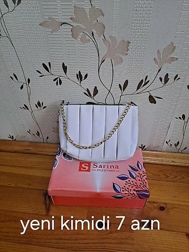 Ağ rəngli qadın çantası - Klassik büzməli ön dizayn - Qızılı zəncirli lalafo.az -da Ağ rəngli qadın çantası - Klassik büzməli ön dizayn - Qızılı zəncirli