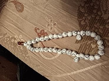 Ağ rəngli təsbeh – üzərində ərəb qrafikasında “Allah” yazılı lalafo.az -da Ağ rəngli təsbeh – üzərində ərəb qrafikasında “Allah” yazılı