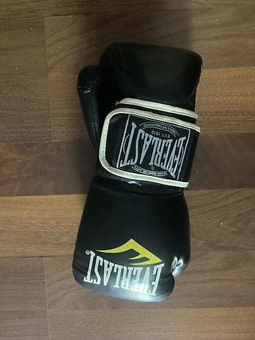 Everlast boks əlcəkləri - Brend: Everlast - Rəng: qara, ağ detallarla lalafo.az -da Everlast boks əlcəkləri - Brend: Everlast - Rəng: qara, ağ detallarla