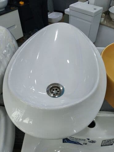 Masaüstü lavabo – oval formalı, parlaq ağ keramika. Xüsusiyyətlər: - lalafo.az -da Masaüstü lavabo – oval formalı, parlaq ağ keramika. Xüsusiyyətlər: -