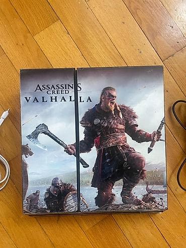 Assassin’s Creed Valhalla temalı PlayStation 4 fat oyun konsolu seti lalafo.az -da Assassin’s Creed Valhalla temalı PlayStation 4 fat oyun konsolu seti