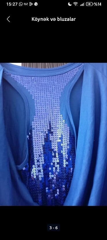 Qadın bluzası – elektrik-mavi rəngdə, qısaqol, yumru yaxalı. Ön lalafo.az -da Qadın bluzası – elektrik-mavi rəngdə, qısaqol, yumru yaxalı. Ön