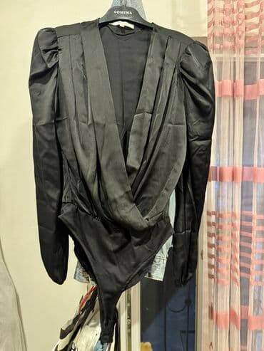 Qadın badi (bodysuit) – qara rəngdə, uzunqollu, atlas effekti verən lalafo.az -da Qadın badi (bodysuit) – qara rəngdə, uzunqollu, atlas effekti verən