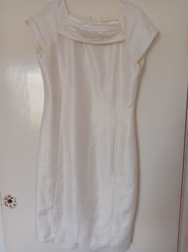 Zərif ağ rəngli qadın donu - Dizə yaxın uzunluq, klassik qələm kəsim lalafo.az -da Zərif ağ rəngli qadın donu - Dizə yaxın uzunluq, klassik qələm kəsim