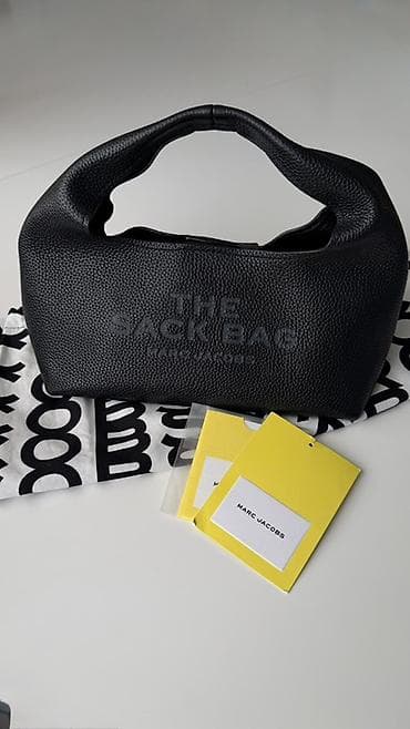Marc Jacobs “The mini Sack Bag” – qara rəngdə, yumşaq teksturalı təbii lalafo.az -da Marc Jacobs “The mini Sack Bag” – qara rəngdə, yumşaq teksturalı təbii