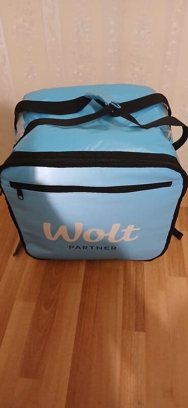 Wolt Partner çatdırılma çantası - Rəng: açıq mavi, qara kənar və lalafo.az -da Wolt Partner çatdırılma çantası - Rəng: açıq mavi, qara kənar və