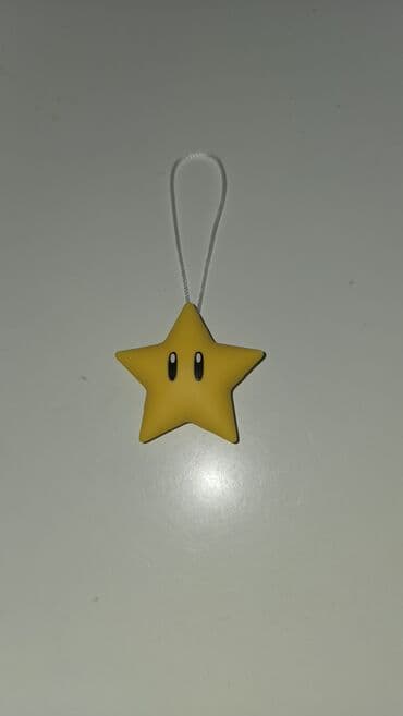 Sarı ulduz fiqurlu asqı/aksessuar - Dizayn: Beşguşəli sarı ulduz, ön lalafo.az -da Sarı ulduz fiqurlu asqı/aksessuar - Dizayn: Beşguşəli sarı ulduz, ön