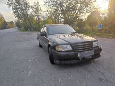 Mercedes-Benz C-Sinif sedan (W202). Qara rəng, 4 qapı, arxa ötürücülü lalafo.az -da Mercedes-Benz C-Sinif sedan (W202). Qara rəng, 4 qapı, arxa ötürücülü
