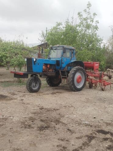 Dest de satilir tek-tek də, Mavi rəngli tək ön təkərli traktora lalafo.az -da Dest de satilir tek-tek də, Mavi rəngli tək ön təkərli traktora