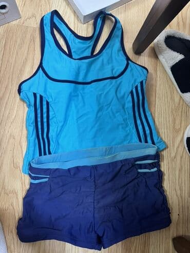 İki parçalı qadın üzgüçülük dəsti - Rəng: mavi və tünd göy lalafo.az -da İki parçalı qadın üzgüçülük dəsti - Rəng: mavi və tünd göy