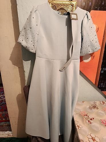 Açıq mavi rəngli zərif xanım paltarı. - Dizüstü/orta uzunluq, A-kəsim lalafo.az -da Açıq mavi rəngli zərif xanım paltarı. - Dizüstü/orta uzunluq, A-kəsim