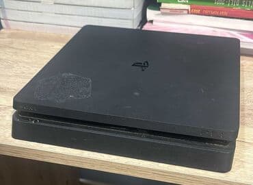 Sony PlayStation 4 Slim oyun konsolu - Model: PS4 Slim - Rəng: Qara - lalafo.az -da Sony PlayStation 4 Slim oyun konsolu - Model: PS4 Slim - Rəng: Qara -